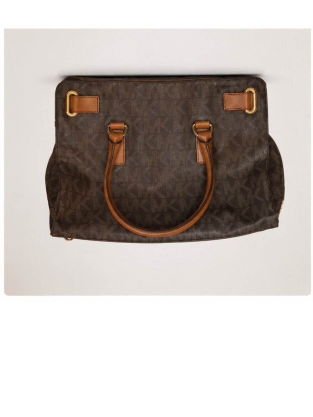 Michael Kors Hamilton satchel in brown monogram coated canvas. Fair